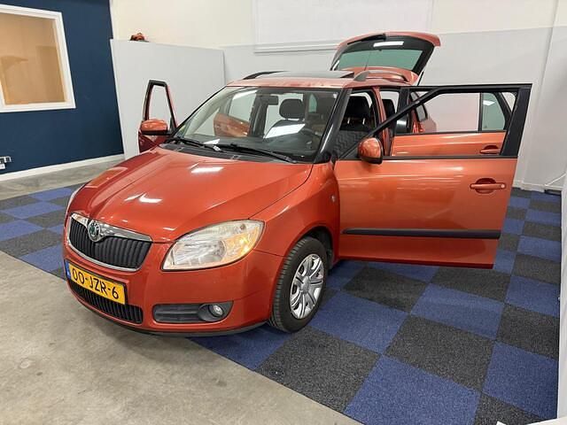 Occasion Skoda Fabia Tour 105 PK (77 kW) 2009 Oranje Stationwagen