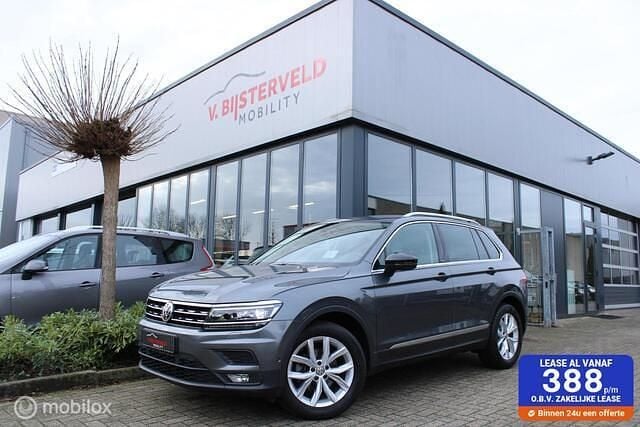 Grijs (metallic) Gebruikt 2019 VW Tiguan IQ Drive SUV | € 23.945 (Super prijs) - Afbeelding 1/4