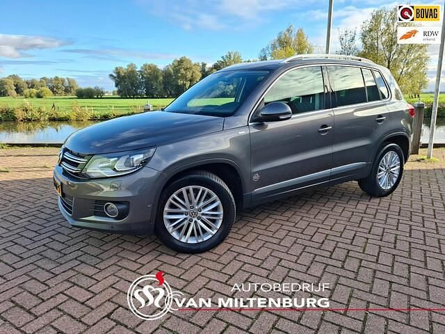 Grijs Gebruikt 2014 VW Tiguan Sport SUV | € 13.450 (Eerlijke prijs) - Afbeelding 1/4