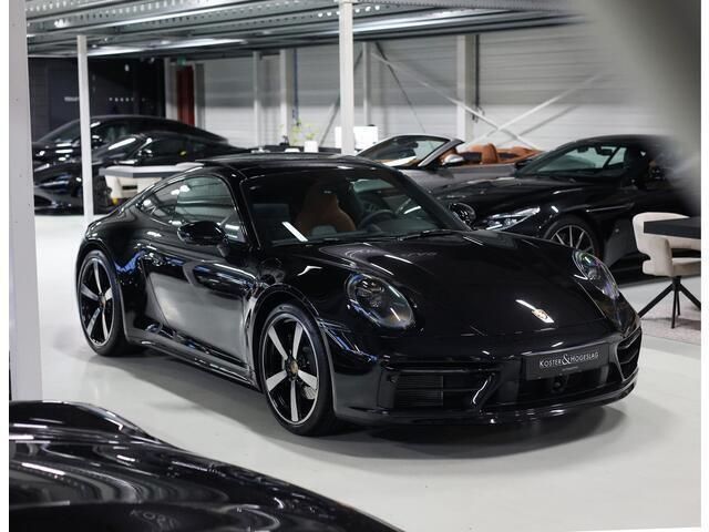 Zwart, metallic lak Gebruikt 2024 Porsche 911 Carrera Sport Coupé | € 184.950 - Afbeelding 1/4
