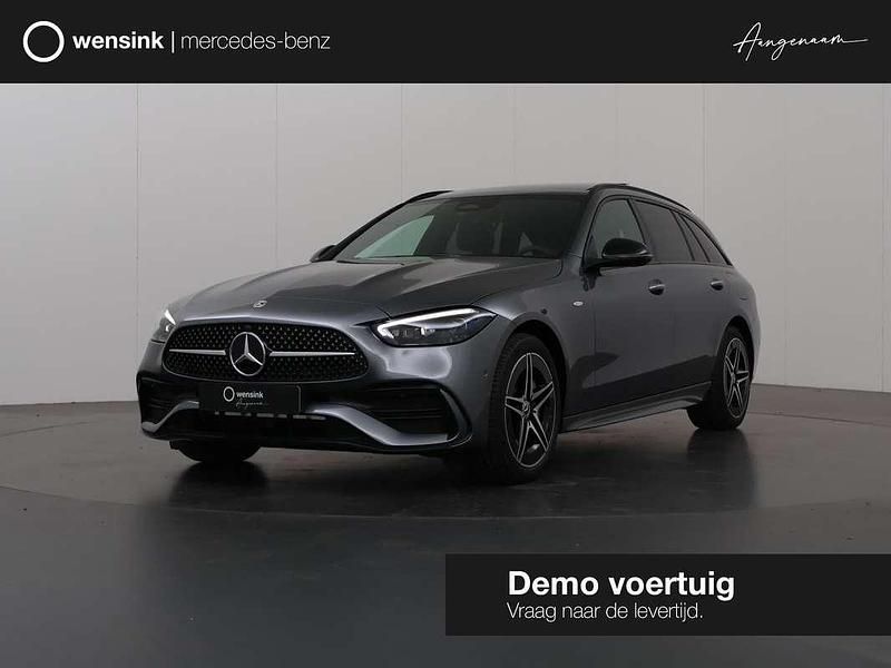 Grijs Nieuw 2025 Mercedes C300e Business Stationwagen | € 66.900 - Afbeelding 1/4