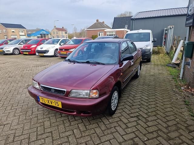 Occasion Suzuki Baleno GLX 97 PK (71 kW) 1998 Rood Sedan