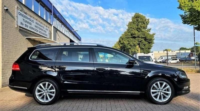 Zwart Gebruikt 2011 VW Passat Highline Stationwagen | € 4.750 (Iets duurder) - Afbeelding 1/4