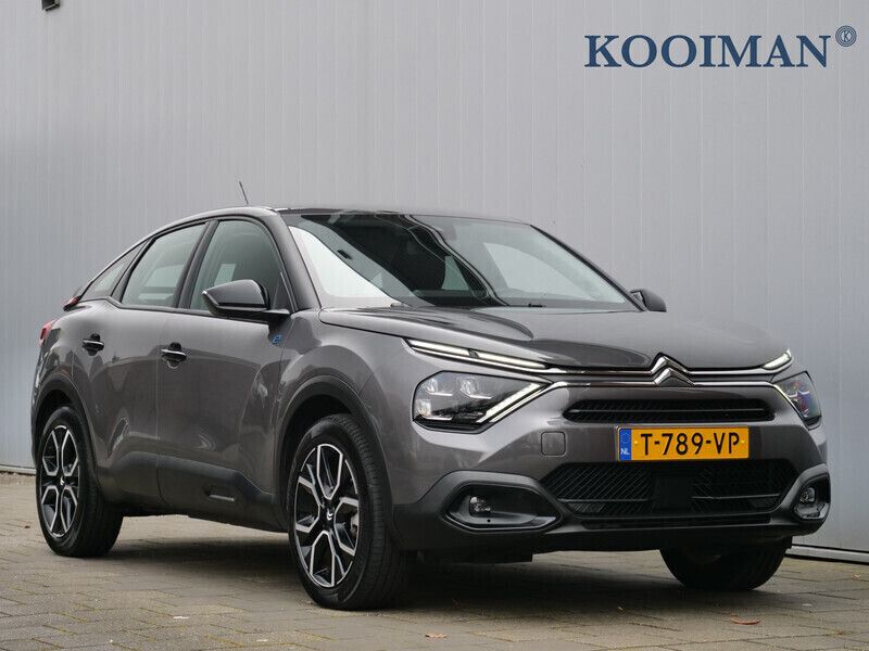 Grijs Gebruikt 2023 Citroën e-C4 Feel SUV | € 19.595 (Eerlijke prijs) - Afbeelding 1/4