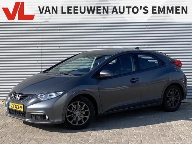 Grijs, metallic lak Gebruikt 2012 Honda Civic Sport Hatchback | € 8.948 (Eerlijke prijs) - Afbeelding 1/4