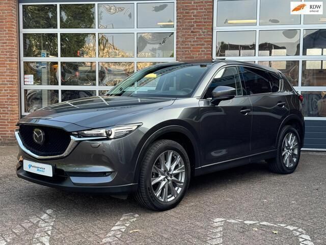 Grijs Gebruikt 2020 Mazda CX-5 Signature SUV | € 30.945 (Eerlijke prijs) - Afbeelding 1/4
