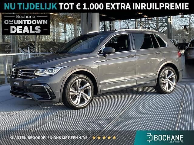 Dolphin grey metallic (grijs metallic) Gebruikt 2020 VW Tiguan Business+ SUV | € 31.900 (Duur) - Afbeelding 1/4
