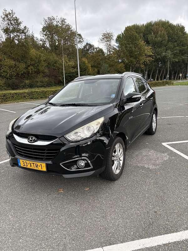 Zwart Gebruikt 2012 Hyundai ix35 SUV | € 6.450 (Eerlijke prijs) - Afbeelding 1/4