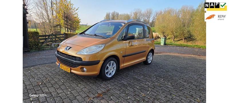 Oranje Gebruikt 2006 Peugeot 1007 Hatchback | € 2.250 - Afbeelding 1/4