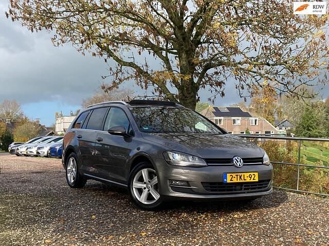 Grijs Gebruikt 2014 VW Golf VII Highline Stationwagen | € 10.975 (Eerlijke prijs) - Afbeelding 1/4