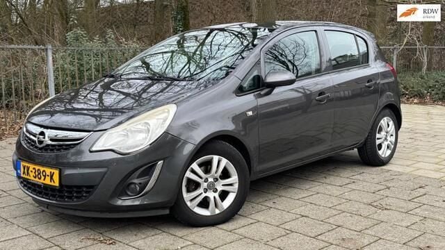 Grijs Gebruikt 2011 Opel Corsa Cosmo Hatchback | € 4.495 (Eerlijke prijs) - Afbeelding 1/4