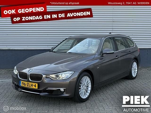 Bruin Gebruikt 2013 BMW 320 Executive Stationwagen | € 11.999 (Eerlijke prijs) - Afbeelding 1/3