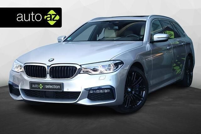 Grijs Gebruikt 2017 BMW 540 Executive Stationwagen | € 39.900 (Goede deal) - Afbeelding 1/4