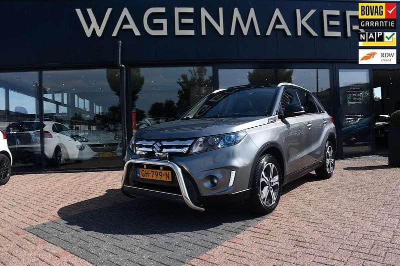 Grijs, metallic lak Gebruikt 2015 Suzuki Vitara SUV | € 16.450 (Eerlijke prijs) - Afbeelding 1/4