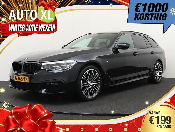 Zwart Occasion 2020 BMW 520 Executive Stationwagen | € 26.940 (Eerlijke prijs) - Afbeelding 1/4