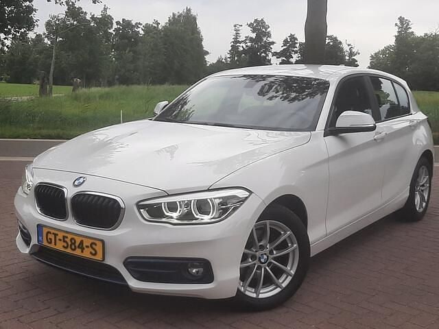 Wit Gebruikt 2015 BMW 118 Hatchback | € 15.750 (Duur) - Afbeelding 1/4