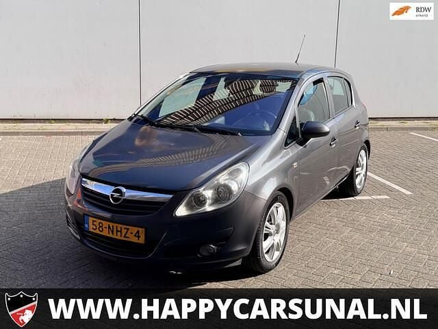Grijs, metallic lak Gebruikt 2010 Opel Corsa Cosmo Hatchback | € 2.450 (Goede deal) - Afbeelding 1/4