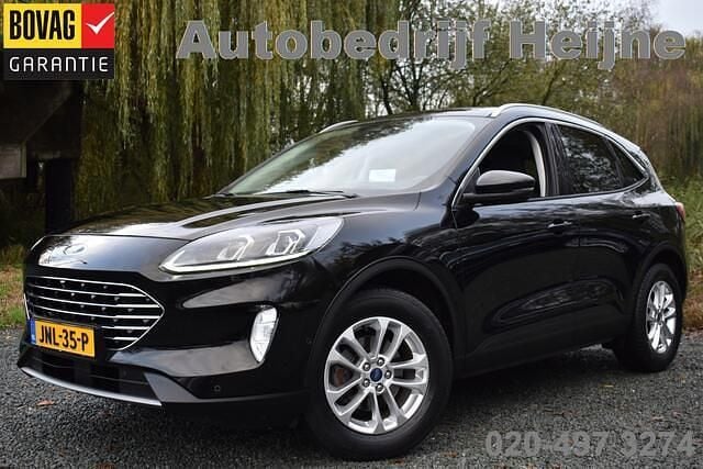 Zwart Gebruikt 2021 Ford Kuga Titanium SUV | € 23.745 (Eerlijke prijs) - Afbeelding 1/4