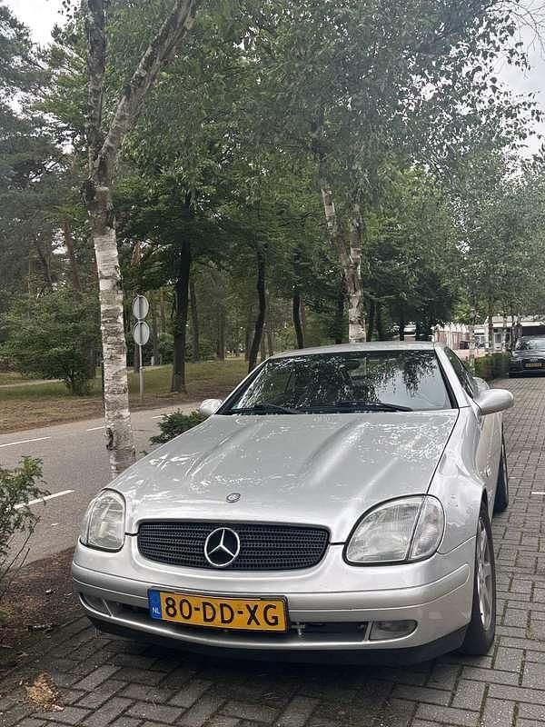 Grijs Gebruikt 1999 Mercedes SLK230 Cabriolet | € 2.000 (Super prijs) - Afbeelding 1/3