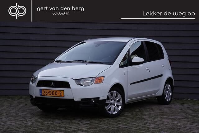 Wit Gebruikt 2011 Mitsubishi Colt Edition Hatchback | € 4.900 (Goede deal) - Afbeelding 1/4