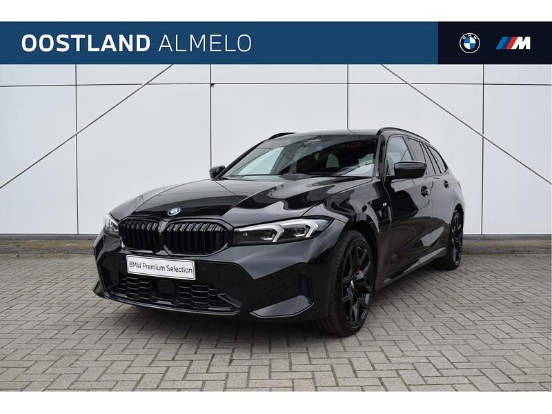 Zwart Gebruikt 2024 BMW 330e Comfort Edition Stationwagen | € 62.950 - Afbeelding 1/4