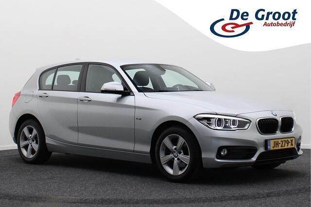 Grijs Gebruikt 2016 BMW 118 Sport Line Hatchback | € 15.950 (Goede deal) - Afbeelding 1/4