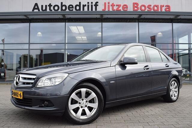 Grijs Gebruikt 2010 Mercedes C180 Business Sedan | € 7.450 (Eerlijke prijs) - Afbeelding 1/4