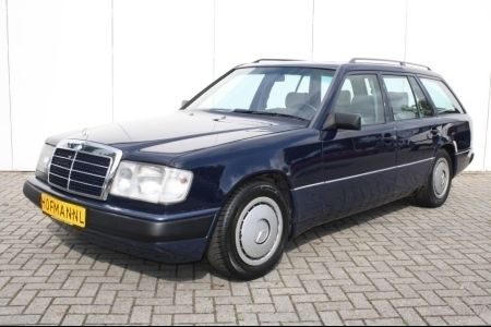 Blauw Gebruikt 1986 Mercedes E230 Stationwagen | € 13.990 - Afbeelding 1/4