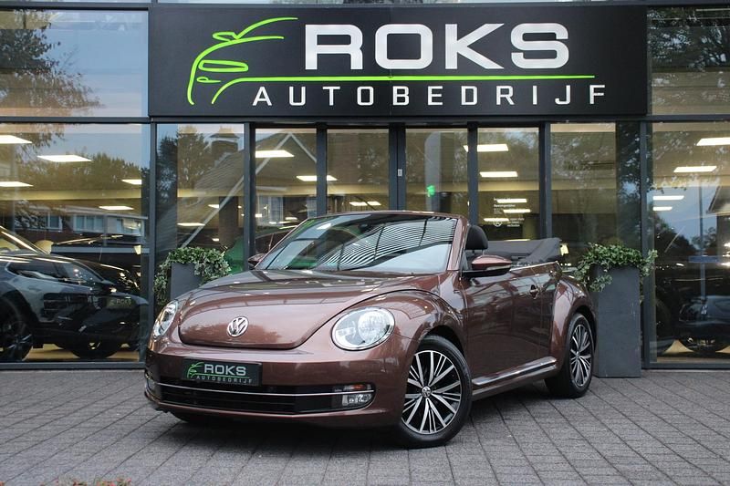 Bruin Gebruikt 2016 VW Beetle Design Cabriolet | € 19.850 (Iets duurder) - Afbeelding 1/4