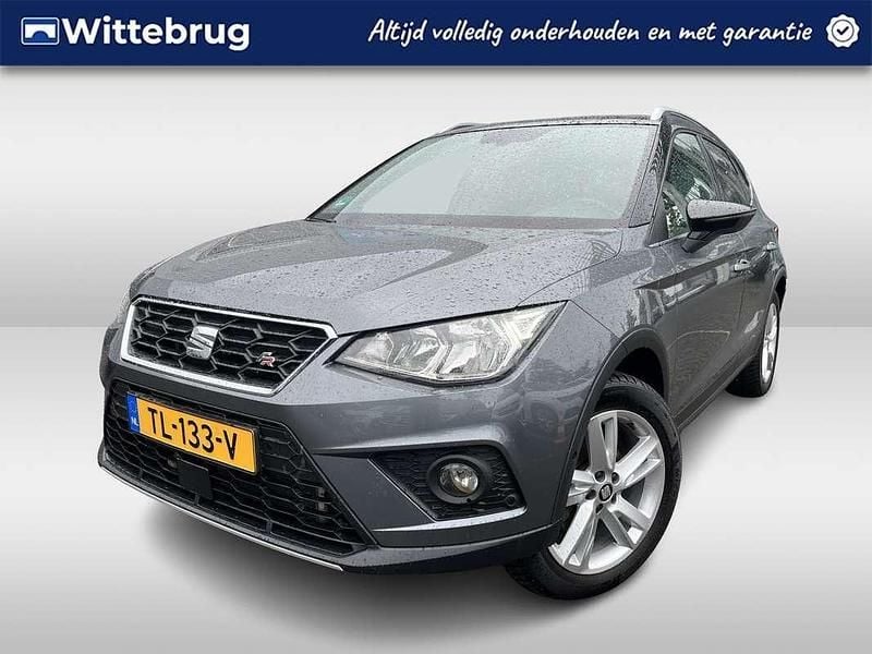 Grijs, metallic lak Gebruikt 2018 Seat Arona FR SUV | € 15.950 (Goede deal) - Afbeelding 1/2