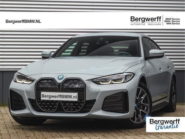 Grijs, metallic lak Gebruikt 2024 BMW i4 M Sport Sedan | € 46.875 (Super prijs) - Afbeelding 1/4