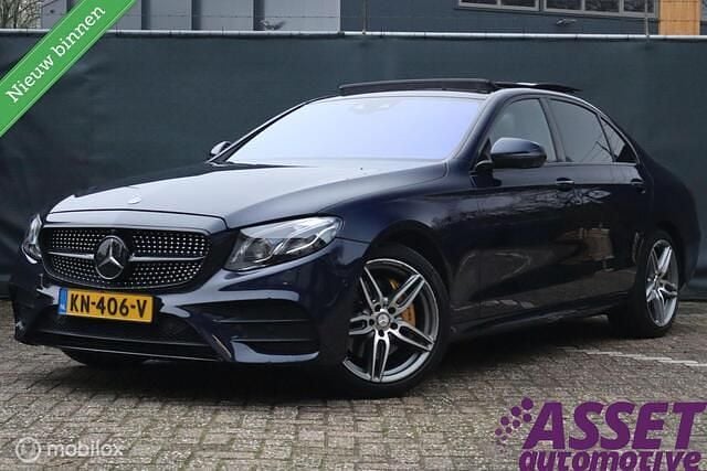 Blauw (metallic) Occasion 2016 Mercedes E200 Prestige Sedan | € 25.995 (Duur) - Afbeelding 1/4