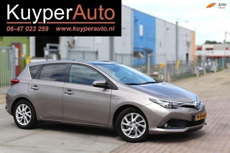 Bruin, metallic lak Gebruikt 2016 Toyota Auris Hybrid Trend Hatchback | € 9.999 (Goede deal) - Afbeelding 1/4