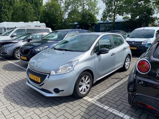 Grijs, metallic lak Gebruikt 2014 Peugeot 208 Access Hatchback | € 3.000 (Super prijs) - Afbeelding 1/4