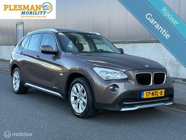 Bruin Gebruikt 2010 BMW X1 Executive SUV | € 8.900 (Iets duurder) - Afbeelding 1/4