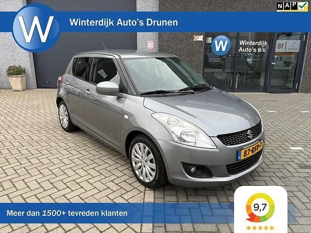 Grijs Occasion 2011 Suzuki Swift Exclusive Hatchback | € 2.999 (Eerlijke prijs) - Afbeelding 1/4