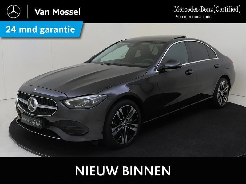 Grijs Gebruikt 2022 Mercedes C300e AMG line Sedan | € 41.945 (Super prijs) - Afbeelding 1/4