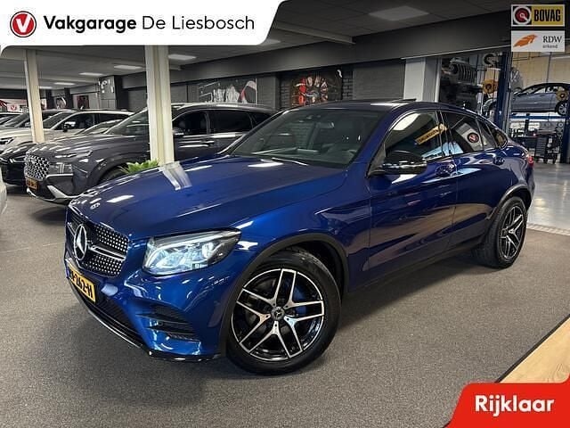 Blauw (metallic) Gebruikt 2017 Mercedes GLC250 Premium Plus Coupé | € 28.950 (Goede deal) - Afbeelding 1/4