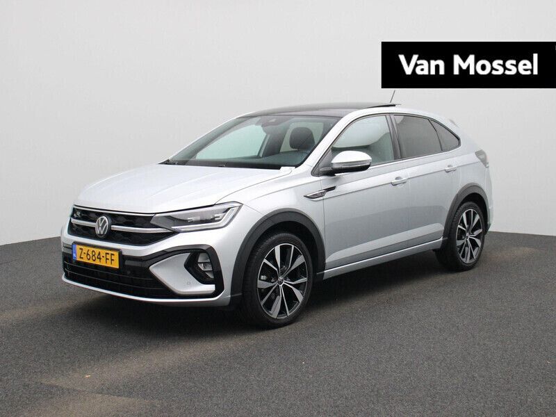 Grijs Gebruikt 2024 VW Taigo Business SUV | € 29.900 (Iets duurder) - Afbeelding 1/4