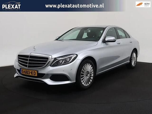 Grijs Occasion 2018 Mercedes C180 Premium Plus Sedan | € 21.945 (Super prijs) - Afbeelding 1/4