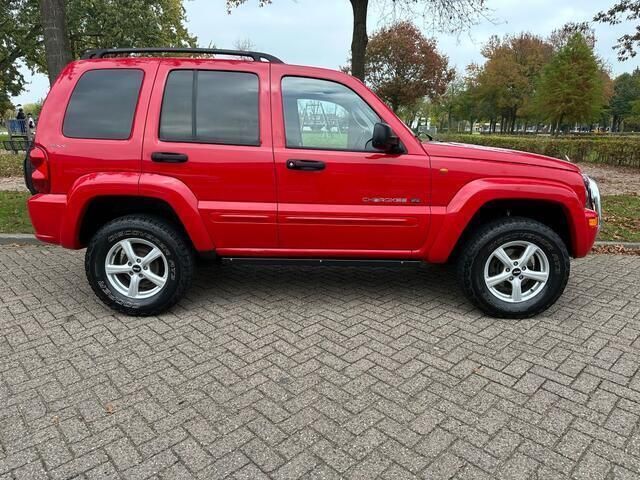 Rood Gebruikt 2002 Jeep Cherokee Sport SUV | € 6.999 (Eerlijke prijs) - Afbeelding 1/4