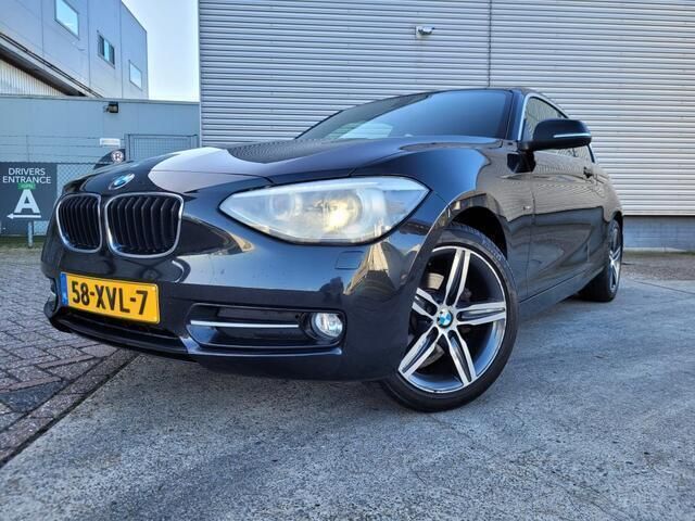 Zwart Gebruikt 2012 BMW 114 M Sport Hatchback | € 9.999 (Eerlijke prijs) - Afbeelding 1/4