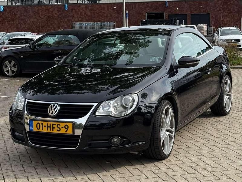Zwart Occasion 2009 VW Eos Cabriolet | € 5.950 (Eerlijke prijs) - Afbeelding 1/4