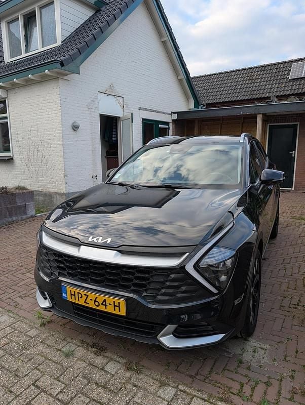 Zwart (metallic) Gebruikt 2022 Kia Sportage SUV | € 23.999 (Super prijs) - Afbeelding 1/4