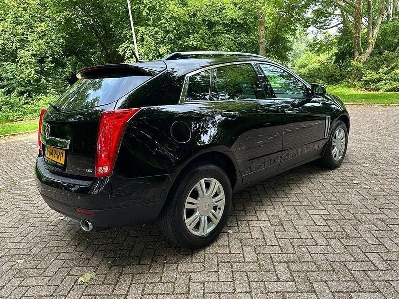 Zwart Gebruikt 2015 Cadillac SRX SUV | € 23.950 - Afbeelding 1/4