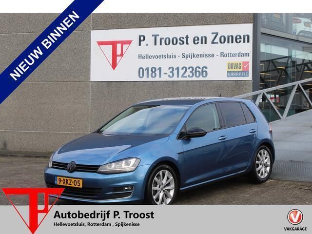 Blauw, metallic lak Gebruikt 2014 VW Golf VII Highline Hatchback | € 8.950 (Iets duurder) - Afbeelding 1/4