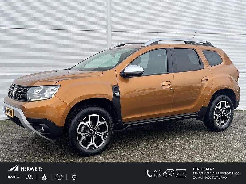 Oranje Occasion 2020 Dacia Duster Anniversary SUV | € 15.435 (Eerlijke prijs) - Afbeelding 1/4
