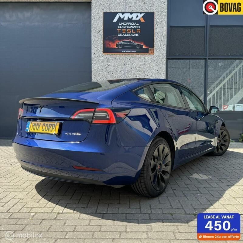 Blauw Gebruikt 2022 Tesla Model 3 Long Range Sedan | € 33.999 (Eerlijke prijs) - Afbeelding 1/4