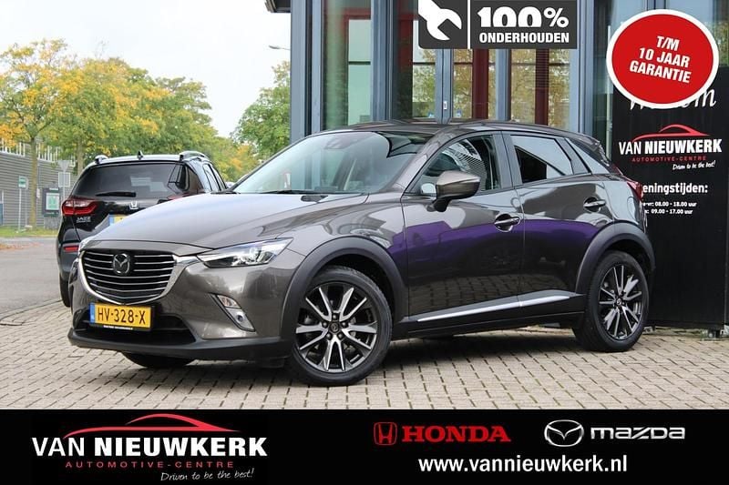 Titanium flash (bruin metallic) Gebruikt 2016 Mazda CX-3 SUV | € 15.900 (Eerlijke prijs) - Afbeelding 1/4