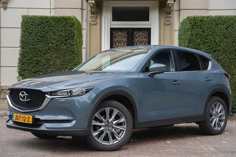 Grijs Gebruikt 2021 Mazda CX-5 Sportive SUV | € 34.940 (Eerlijke prijs) - Afbeelding 1/4